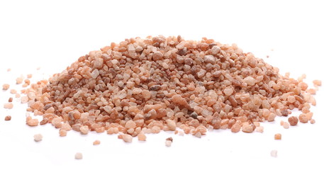 Himalayan salt grains, crystals isolated on white background