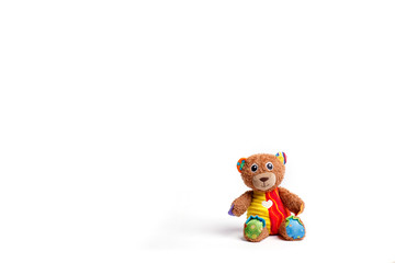 Colored toy teddy isolated on white background