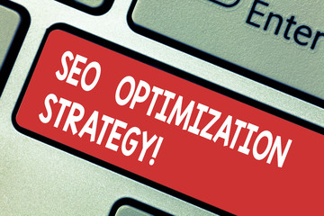 Text sign showing Seo Optimization Strategy. Conceptual photo process of organizing a website s is content Keyboard key Intention to create computer message pressing keypad idea