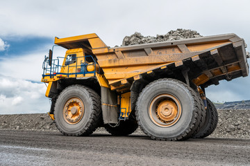 Large quarry dump truck. Transport industry.