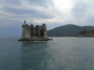 Fantastic spring panorama of Portovenere town. Splendid evening scene of Mediterranean sea, Liguria, province of La Spezia, Italy, Europe. Traveling concept background