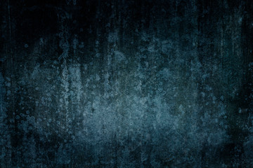 Dark blue grungy weathered wall