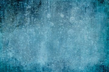 Distressed blue grungy wall background