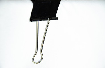 clothespin clerical black color and white background