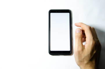 Smartphone in male hands on a white background