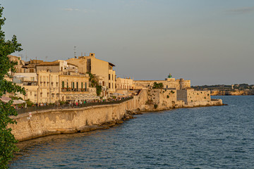 Fototapeta na wymiar Syracuse, Sicily. Beautiful view of the Ionian Sea coastline in Ortigia, Italy
