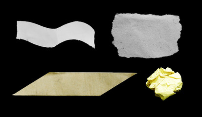 Ripped paper on black background, space for advertising copy.