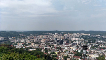 Fototapeta na wymiar View on city Lviv with overview area in park Sky with clouds