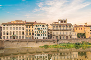 Fototapeta na wymiar Beautiful view of the embankment of the Arno River in Florence, Italy