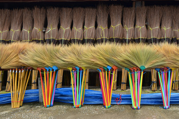 Many pile of colorful broomstick , sorting for sale
