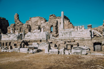 Fototapeta na wymiar ancient bas-reliefs. Excavations. The ruins of the ancient city of Turkey. Antalya coast. Antique theater.Ruins of the old theatre. Antalya Province. Pamphylia.Amphitheater in Turkey