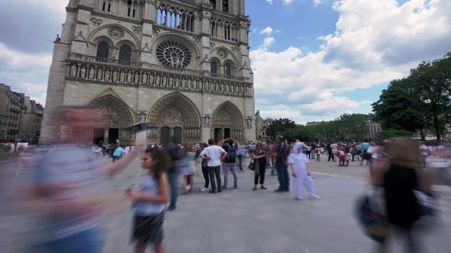 Paris Hyperlapse - Notre Dame Cathedral. Many tourists in front of the stunning cathedral