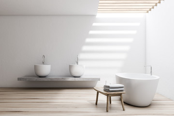 Fototapeta na wymiar White bathroom with double sink and tub