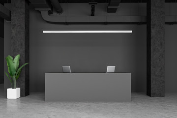 Gray office reception desk in industrial style