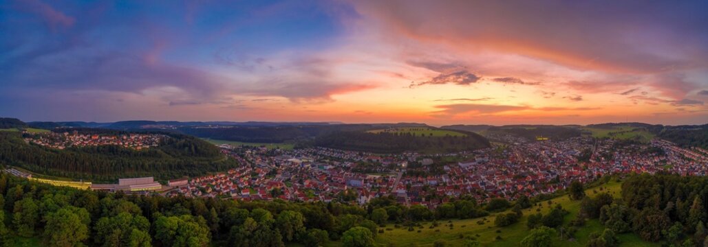 Beautiful mountain sunset scenery with a german town in Baden W rtemberg called Albstadt.