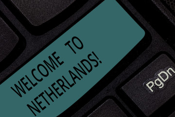 Handwriting text Welcome To Netherlands. Concept meaning Warm greeting to the visitors of Netherlands Keyboard key Intention to create computer message pressing keypad idea