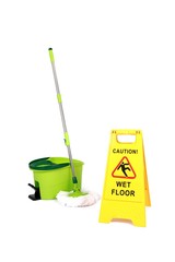 Fototapeta premium Yellow Caution slippery wet floor sign with mop and bucket in the background - Safety sign cleaning service - isolated on white background