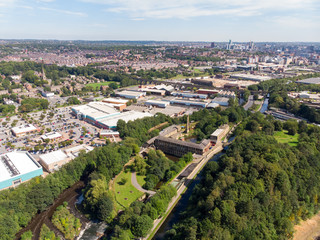Aerial photo of the town of Armley located in Leeds West Yorkshire in the UK, showing a typical British town on a bright sunny day.