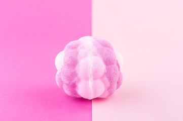 Aroma bath bomb on pink background