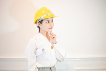 Engineer woman is smiling on white background