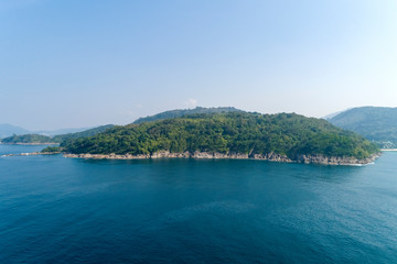 Naklejka na ściany i meble landscape nature scenery view of Beautiful tropical sea with Sea coast view in summer season image by Aerial view drone shot, high angle view
