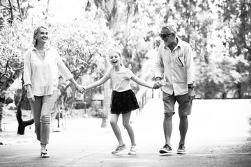 Happy family with children in park outdoors