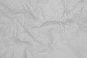 Gray crumpled sheet of paper, background, wallpaper.