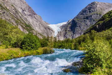 Naklejka na ściany i meble Briksdal glacier in Norway wel known arm of the large Jostedalsbreen glacier in Oldedalen valley in Norway, Scandinavia.