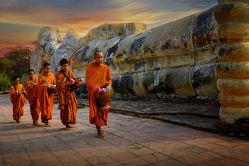 Monks and novices at Phra Non Temple, Wat Lokayasutharam Phra Nakhon Si Ayutthaya District