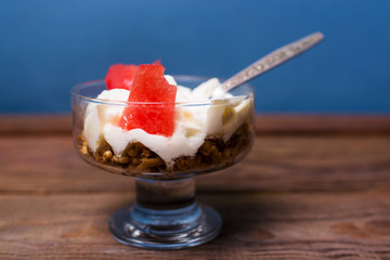 Ice cream with nuts and slices of watermelon