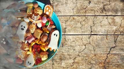 Halloween Jack o Lantern candy bowl with candy and halloween cookies Trick or Treat 