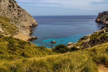 Fototapeta na wymiar Scenic view on wonderful rocky bay Cala Figuera on balearic island Mallorca, Spain on a sunny day with clear turquoise water in different colors