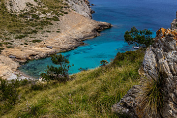 Scenic view on wonderful  rocky bay Cala Figuera on balearic island Mallorca, Spain on a sunny day with clear turquoise water in different colors