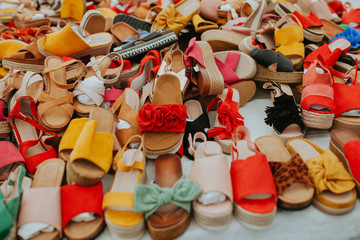 Obraz premium Colorful Shoes for sale in market