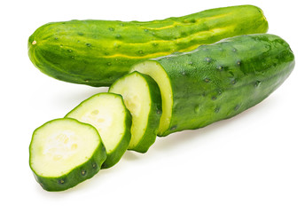 Cucumbers, whole and chopped, raw and fresh with drops of water. Isolated on white background.