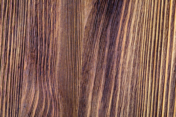 Precious wood texture. Of rustic aspect and dark, ocher, brown, toasted, black tones. The veins and knots are appreciated.