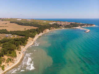 Fototapeta na wymiar Aerial photo of the beautiful small town and seaside resort of known as Obzor in Bulgaria taken with a drone on a bright sunny day showing the beach and ocean sea front.
