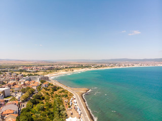 Obraz premium Aerial photo of the beautiful town of Nessebar, located in the Sunny Beach area of Bulgaria, taken with a drone on a bright sunny day showing the houses and businesses of the town