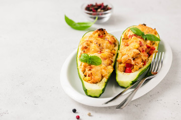 Zucchini boats. Selective focus, space for text.