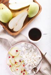 cottage cheese with slices of pear, Apple and cranberries