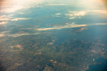 Fototapeta na wymiar Aerial view while flying over the Mediterranean Sea in Europe. 