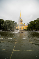 Naklejka premium Pond in front of the facade of the Admiralty building -Headquarters of the Russian Navy in St Petersburg,
