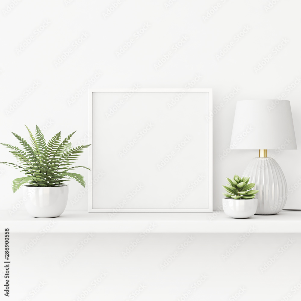 Poster interior poster mockup with square white frame standing on the table with plants in pots and lamp on