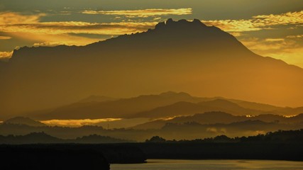 Mount Kinabalu during sunrise over Sulaman River Bridge