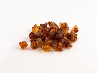 a group of peach gum on white background