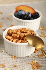 Portion of muesli granola breakfast with yogurt