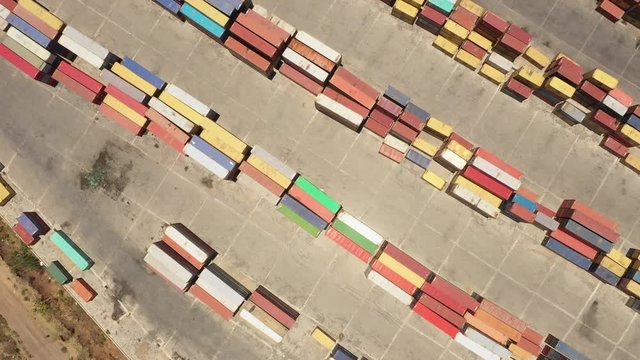 Overhead drone shot of containers at dry port of Mojo in Ethiopia, connected by railway line to Djibouti