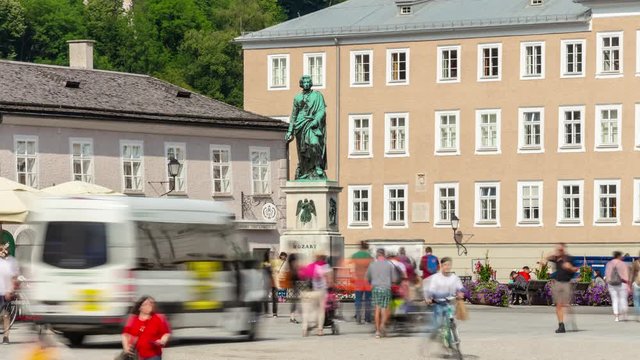 salzburg city center sunny day famous crowded square monument panorama 4k timelapse austria  
