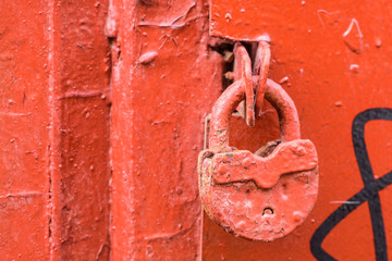 The image of a red retro padlock