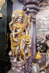 Fototapeta premium Hindu Goddess Saraswati of Knowledge, Music, dance,art and study statues at Sri Krishnan Temple, Bugis, Singapore.